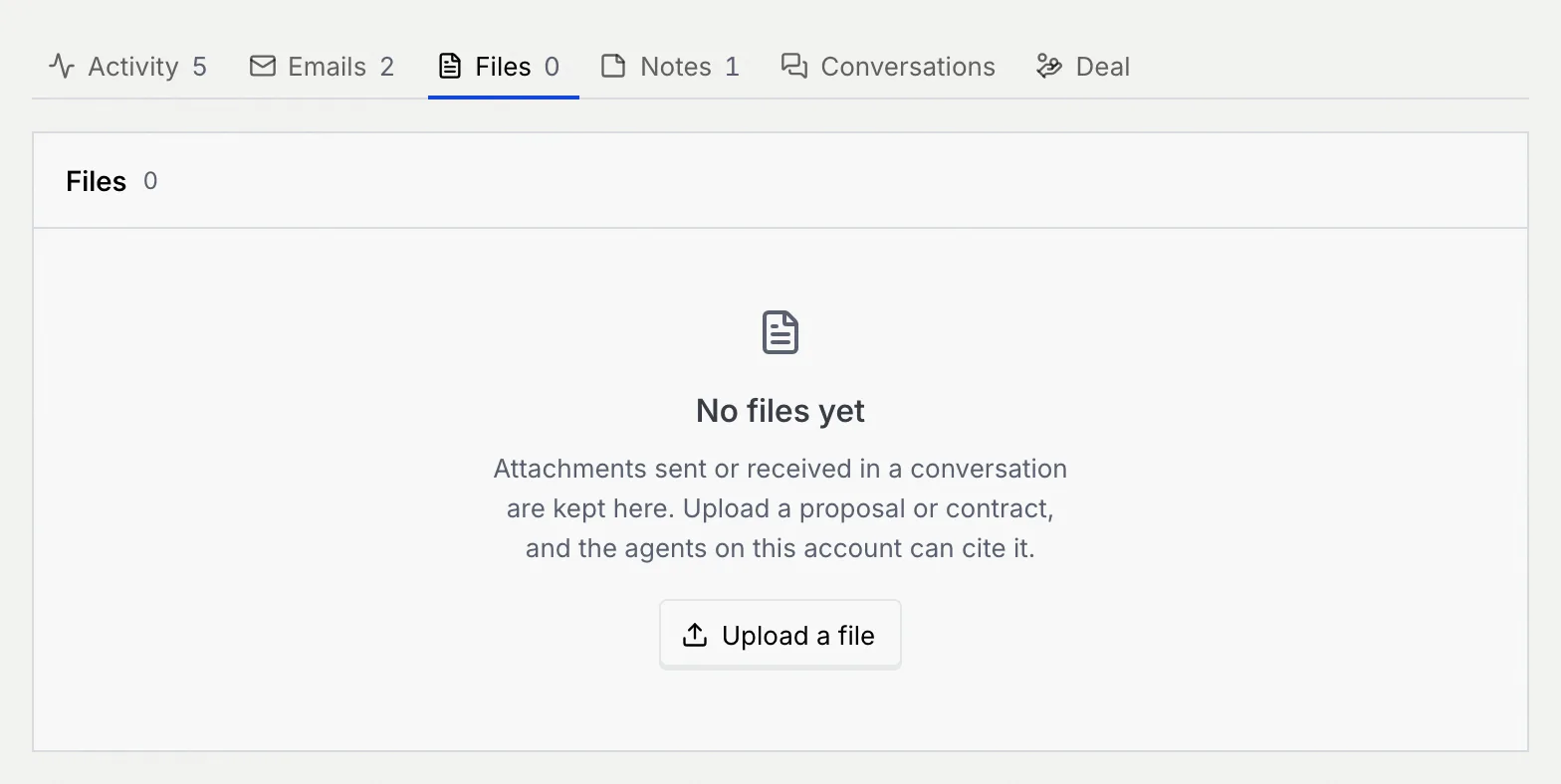 The empty Files tab: No files yet, attachments from conversations are kept here, with an Upload a file button